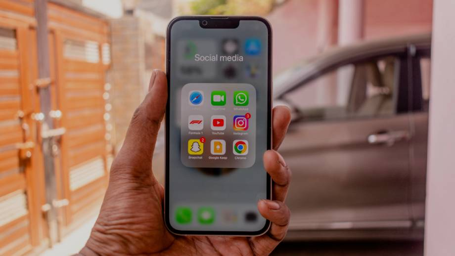 A parent checking social media platforms using reliable WiFi